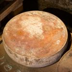 aged cheese in the cellar ready to eat eating cooking appetizer meal food snack on the table food