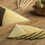 Slices of Spanish Manchego cheese